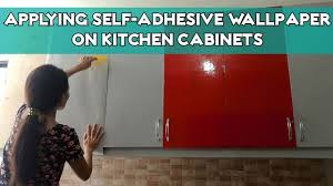 applying glossy self adhesive wallpaper