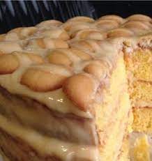 This banana pudding poke cake combines the flavor of rich, moist banana pudding with the fun of a poke cake. Recipe Momma Banana Pudding Cake Allcakepict Banana Pudding Banana Pudding Cake Dessert Cake Recipes