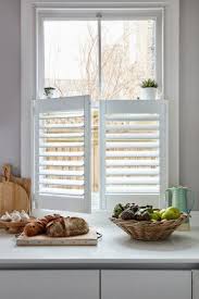 I have a two story craftsman and am looking for a darker gray to paint the exterior of my house (gray, white trim with black shutters). Kitchen Shutters