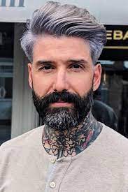 However, a lot of greying comes down to genetics, with some guys turning into silver foxes as young as in their 20s, while others can have a full head of dark hair well into their fifties. To Dye Or Not To Dye Are Silver Hair Men Still On Trend Silver Hair Men Mens Hairstyles Grey Hair Men