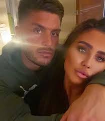 Lauren Goodger denies lusting after Christmas proposal as beau Charles  Drury moves in