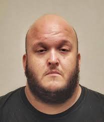 A former state employee who populated his social media page with photos of  women in skimpy clothing and provocative poses groped and tried to kiss a  Wayne medical office employee during a