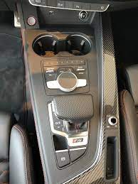 View Of Center Console Gear Shift And Touch Pad Navigation On The 2018 Audi Rs5 In Misano Red Pearl With Black Inte Audi A5 Audi Dealership Audi A5 Sportback