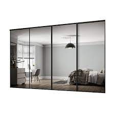 Shop for sliding wardrobe door kits, accessories more online at bq today. Classic Mirrored Black 4 Door Sliding Wardrobe Door Kit H 2260mm W 2978mm Diy At B Q