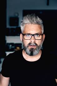Beards tend to go grey before the rest of your head, so a beard in your 30s can lend gravity and authority to someone who is otherwise young looking. Silver Fox Older Men With Long Grey Hair Novocom Top