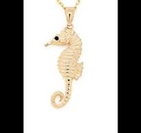 TQ Original 14k yellow gold seahorse pendant with sapphire eyes 4.5 gr
