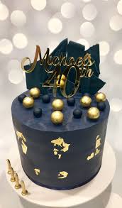 Name And Gold Birthday Cake All Class Topped With Gold Covered Lindt Chocolate Balls Painted Navy Ganache And Touches O Cake Lindt Chocolate Birthday Cake