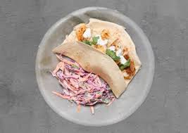To assemble the tacos, layer two tortillas together and place some slaw in the bottom of the tortilla with a few chunks of the fish. Cajun Fish Tacos Recipe Hellofresh
