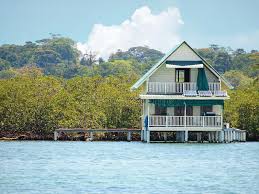 Maybe you would like to learn more about one of these? Tropical House Over Water With Solar Panels Stock Image Image Of Seafront Forest 39248847