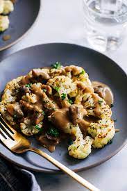 Cauliflower Steaks With Mushroom Gravy By Ohmyveggies Com Recipe Cauliflower Steaks Vegan Fall Recipes Healthy Stuffed Mushrooms