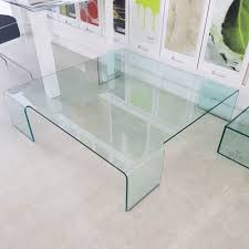 Angelo cortesi designs the curved glass table, ponte, for fiam. Neutra Coffee Table