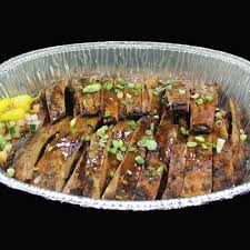 A splash of lime juice and a hint of jerk seasoning add tropical taste. Party Platters Jamaican Grill
