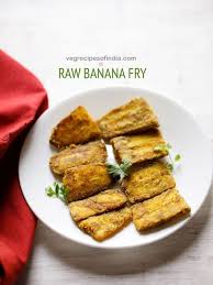 Peel the raw banana and cut it into two pieces and cut it into small pieces. Raw Banana Fry Recipe With Step By Step Pics Crispy As Well As Tasty Banana Fry Made With Unripe Bananas Or Plan Raw Banana Fried Bananas Indian Food Recipes