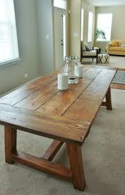 Here's a beautiful diy farmhouse table that features a stunning table along with two benches. Holy Cannoli We Built A Farmhouse Dining Room Table Diy Dining Farmhouse Dining Room Table Farmhouse Dining Table