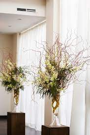 Tall Curly Willow Ceremony Arrangements Wooden Pedestals Tall Arrangements Life In Bloomspring 19 East Ceremony Arrangement Floral Decor Inspiration Wedding
