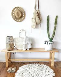 Scandinavian interior design of living room with rattan console, wooden chair, mock up poster frame, pampas in vase and trendy home accessories. How To Decorate A Coastal Bohemian Interior Tlc Interiors