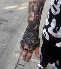 Cool rose tattoo on right hand. Top 41 Badass Hand Tattoos For Men 2021 Inspiration Guide