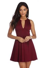 This Pretty And Pleated Skater Dress Features A Sleeveless Bodice Narrow Shoulder Straps A Deep V Neckline Padd Pleated Skater Dress Waistband Dress Dresses