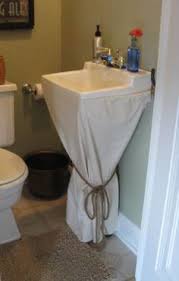 Discover the best designs for 2021 in this huge gallery! 20 Sink Skirt Ideas Pedestal Sink Storage Sink Skirt Small Bathroom