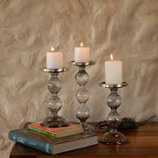 Arrange pillar candles in hurricanes and lanterns to keep outdoor parties going all night, or dine intimately with modern taper candle holders. Grey Glass Pillar Candle Holders Big Candle Holders Buy Online At Fanusta Candlewares Buy Online At Fanusta Sale Buy Online At Fanusta Fanusta