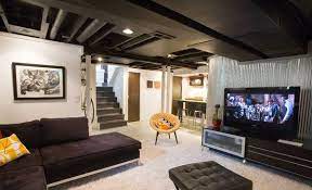 Cover a basement wall with stacked stone or brick veneer, or replace ceiling tiles with stained hardwood panels and beams. 15 Modern And Contemporary Living Room Basement Designs Home Design Lover