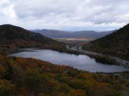 The park's cannon mountain ski slopes rise directly to the southwest of the lake. Echo Lake Franconia Notch Wikipedia
