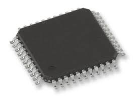 A variety of microcontroller boards laid out on a table.