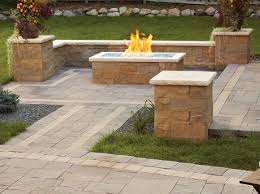 You can hire someone to build a wall for you, or you can tackle the job yourself. Firepit Anchor Block Company