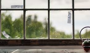 Take a piece of masking tape, or other strong tape, loop it around your fingers backward so the sticky side is facing out, as if you were trying to tape a package together without the tape showing. How To Clean Tape Residue Off Windows And Glass