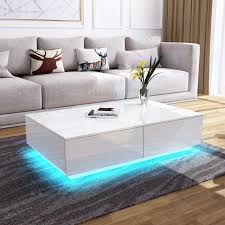 This coffee table with two generous storage drawers is a great way to corral items like toys, magazines, remotes and keep them out of sight, yet accessible. Modern Rgb Led Light Coffee Tea Table With Storage Drawers Shelvs High Gloss Living Room Furniture White 4 Drawers 95 60 31cm Buy Online In United Arab Emirates At Desertcart 141196345