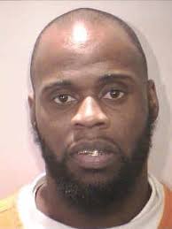 Man charged in '06 murder during sentencing for gun possession