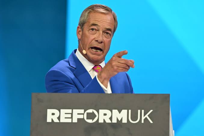 Nigel Farage suspends Reform UK officials after claims the party broke funding rules | AP News