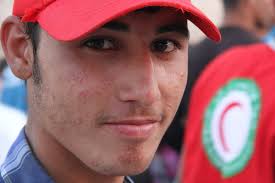 Volunteers with the Iraqi Red Crescent Society in Sinjar are young, in  their teens and early 20s. Let's follow Sakar, Salam, and Emad-Aldenu  through their day as they deliver relief to people