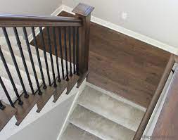Stairs With Combination Of Carpeting And Hardwood Hardwood On Stair Landing Carpet Stairs Flooring For Stairs Stairs Landing Design