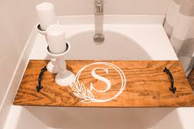 At american standard, we know the value of a bathtub, used for everything from a relaxing soak to bathing your kids or washing the dog. Diy Bathtub Tray Using Scrap Wood 3 Different Ways Her Happy Home