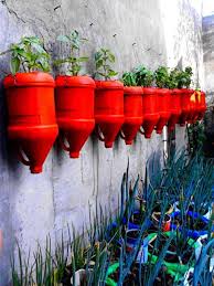 Fun Uses For Old Milk Jugs 20 Pics Old Milk Jugs Plastic Bottle Planter Bottle Garden