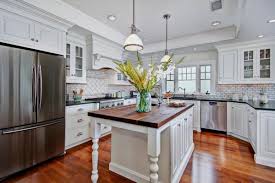 Light wood cabinets work in a colonial kitchen, but many designs are complete with cabinets painted in neutral colors, like white, beige and pale yellow. Colonial Style Kitchen As Distinctive Feature Of Chic Interior