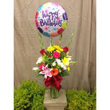 (3) bright pink purple and yellow flowers arranged low and compact in low vase. Birthday Wish In Richmond Ca Park Florist