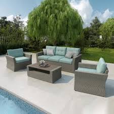 The set includes cushions, an accent table, and two patio chairs. Martha Stewart Patio Conversation Sets You Ll Love In 2021 Wayfair