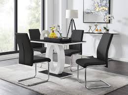 Some sets come with plush swivel chairs for the head and foot of the table. Furniturebox Uk Giovani Black White High Gloss Glass Dining Table Set And 4 Lorenzo Chairs Seats 4 Chairs Buy Online In Bahamas At Bahamas Desertcart Com Productid 48349247