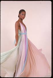December 1st is world aids day. Beverly Johnson Looks Gorgeous While Modeling A Halston Gown In The 1970s Halston Dress Fashion 70s Fashion