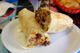 Served with steamed white or brown rice and your choice of side. Taste Testing New Hawaiian Burrito With Wing Lam At Wahoo S Newport Beach News