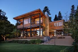 Many lake house floor plans are built into a hill overlooking a body of water. Lakefront Home Designs