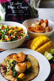 Similar to bok choy but with uniform light green stems and leaves, mini shanghai bok choy is young, very tender chinese cabbage that is milder than white bok choy and slightly less. Shrimp Tacos With Baby Bok Choy Slaw Delicious Healthy Recipes Seafood Recipes Easy Dinner Recipes
