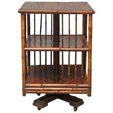 Rak buku translated to english. Superb 19th Century English Turning Bamboo Table On Wheels Bamboo Table Bamboo Bamboo Furniture