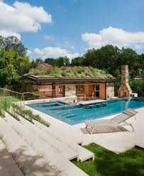 A mediterranean home may have a curved pool surrounded by palm trees and a cascading waterfall. 75 Beautiful L Shaped Pool House Pictures Ideas March 2021 Houzz