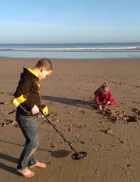 You only really need a basket that you can sift the sand through. Winter Treasure Hunting On Fraisthorpe Beach Yorkshire Wonders