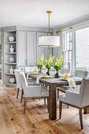 Featured sales new arrivals clearance lighting advice. Light Gray And Gold Dining Room With Glass Top Table Transitional Dining Room