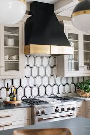 Black And Gold Kitchen Floor Tiles Large Scale Black And White Arabesque Mosaic Backsplash Tile Paired Perfectly With A Black And Gold Black Kitchen Decor Geometric Kitchen Simple Kitchen Design