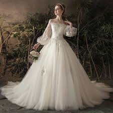 Elegant Ivory See Through Wedding Dresses 2019 Princess Off The Shoulder Puffy Long Sleeve Backless Appliques Lace Flower Pearl Chapel Train Ruffle Puffy Wedding Dresses Wedding Dresses Romantic Elegant Wedding Gowns